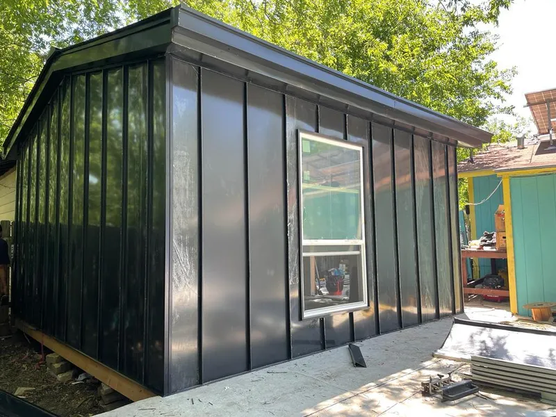 Black standing seam metal wall panels for Metal Roof Installation in Clyde